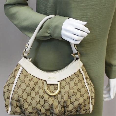 gucci d ring hobo bag|Gucci hobo bag with tassels.